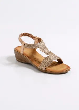 Wedge sandals with intertwined straps