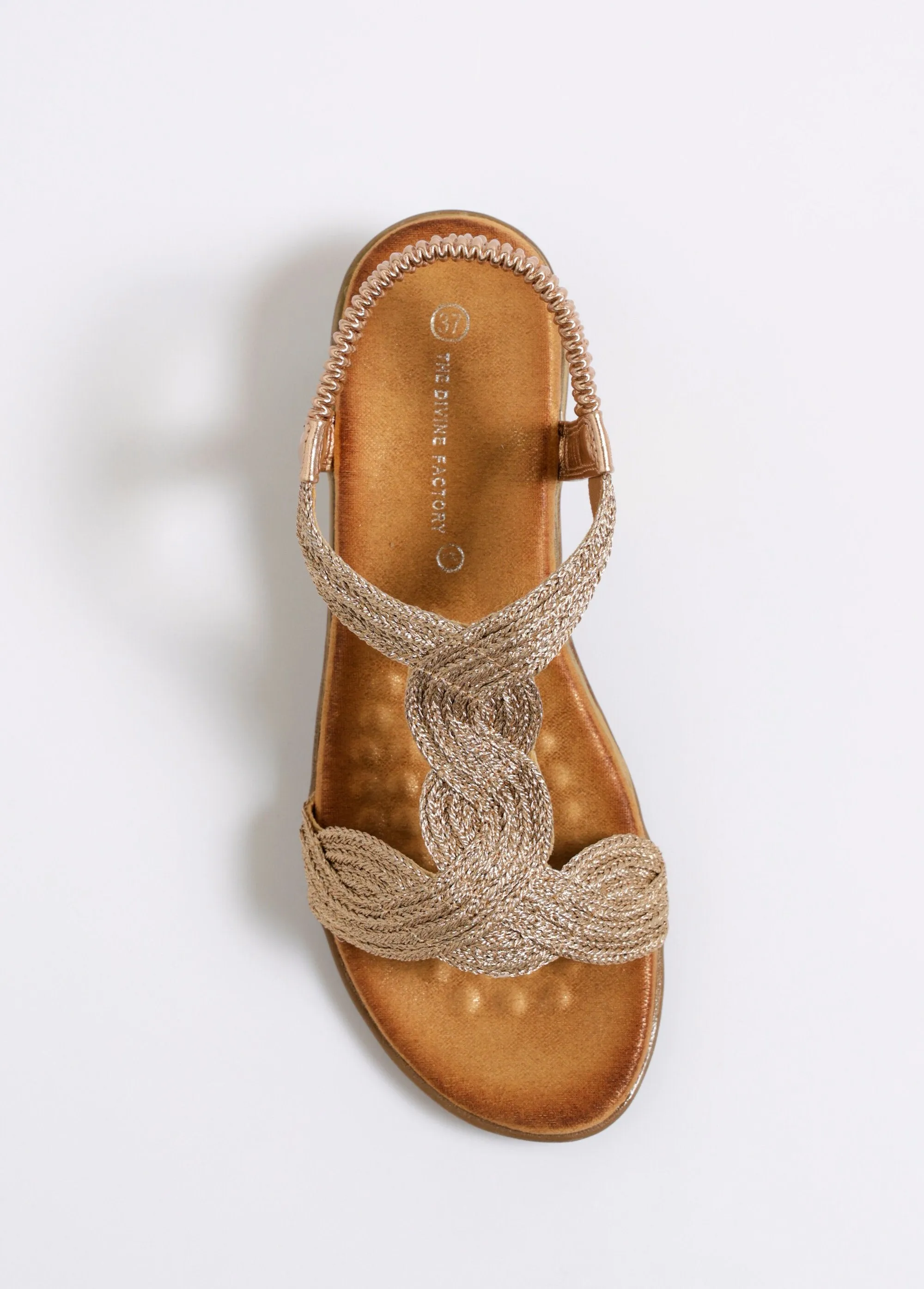 Wedge sandals with intertwined straps